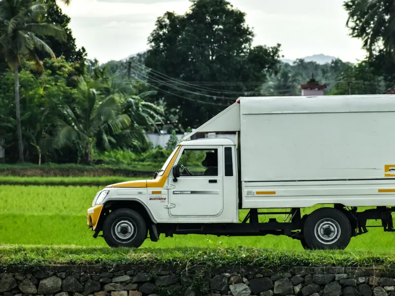 Closed container truck used for safe vehicle and household transport from Kakinada