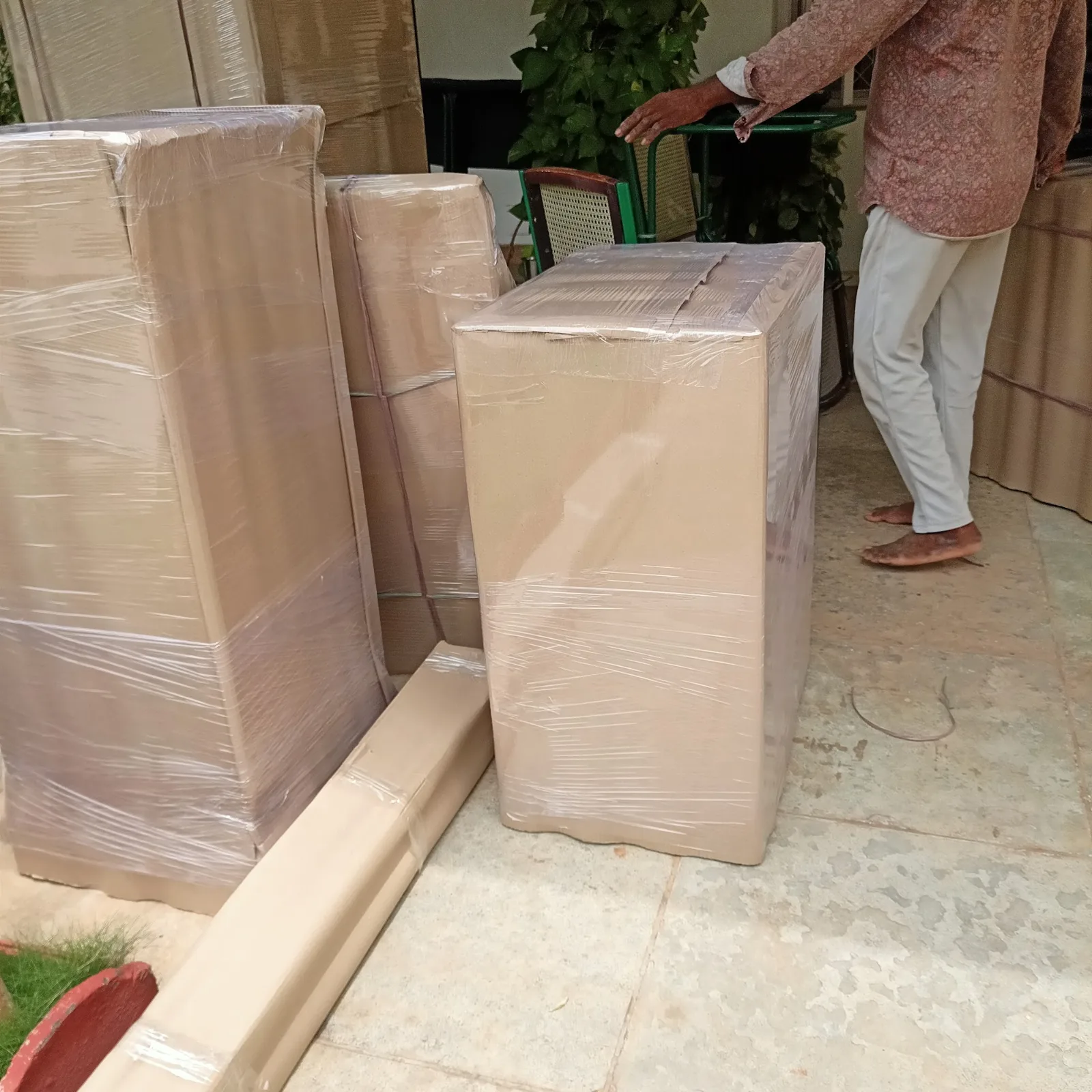 Packed furniture ready for loading during house shifting in Rajahmundry